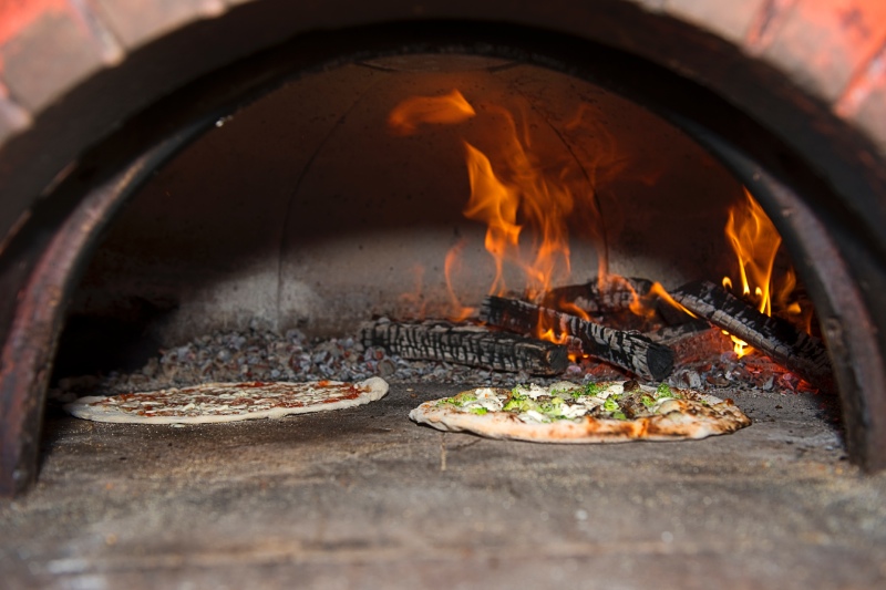 Rolling in Dough, a Greenport pizza company, brought their vintage truck, retrofitted with a wood burning pizza oven, to offer their delicious pizza to those who came out Saturday morning.