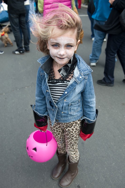 This little ghoul, 5-year-old Coco Lohmiler, had her pink pumpkin ready for treats.