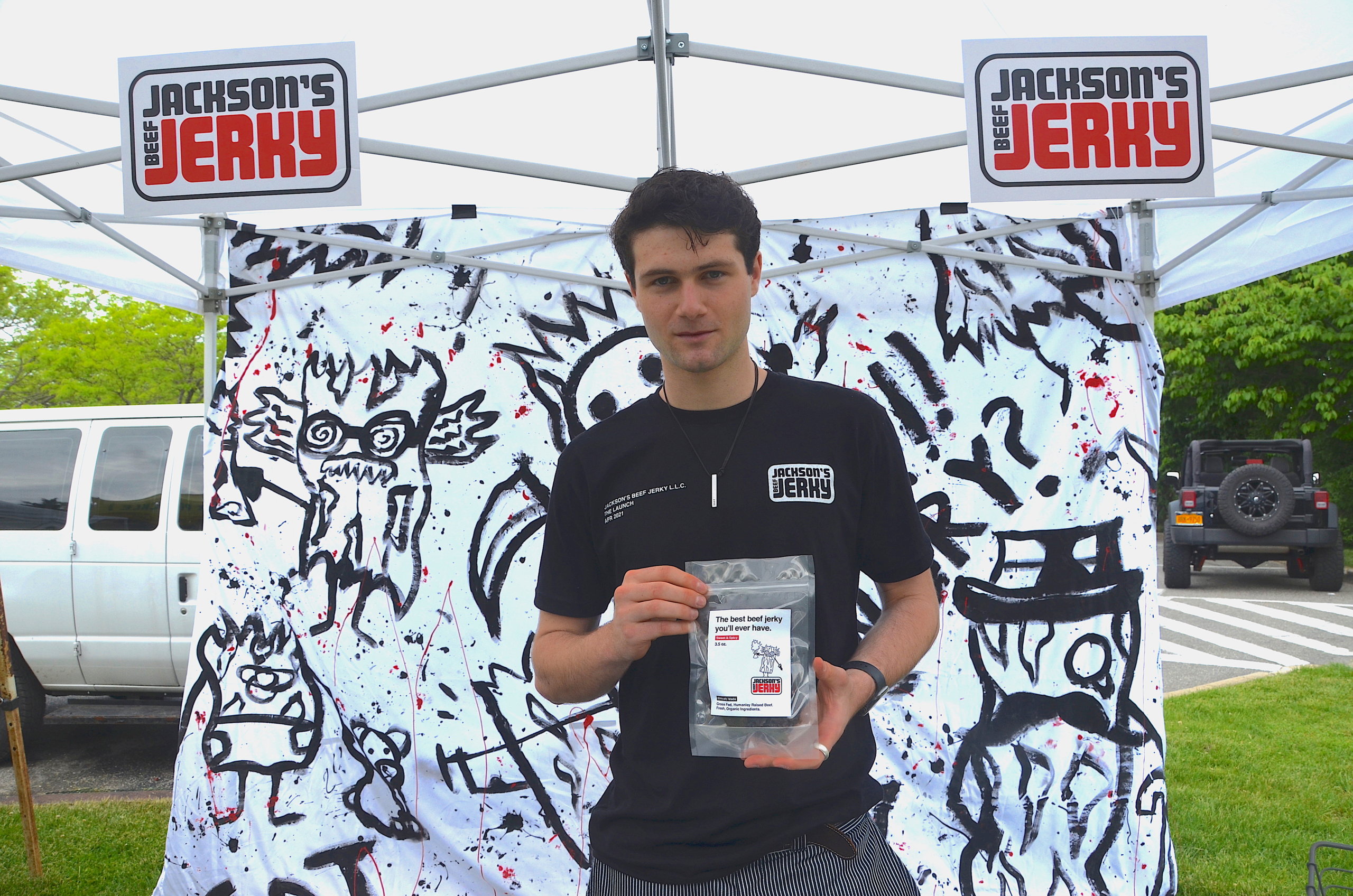 Jackson Baris holding Jackson's Beef Jerky