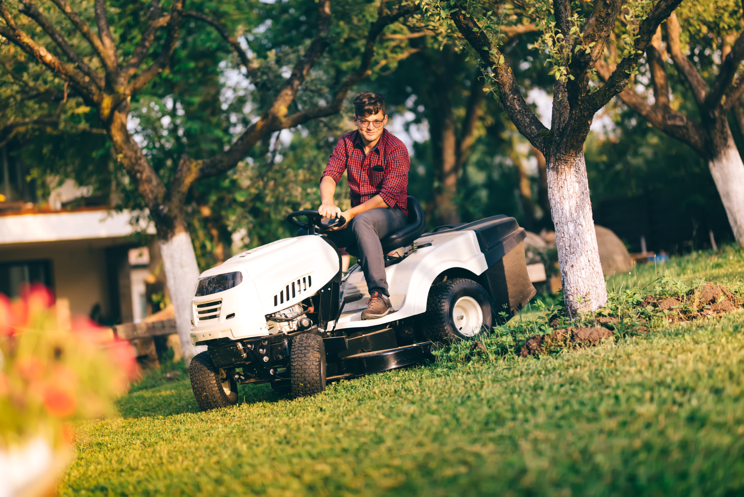 Mowing is a key part of fall lawn care. Lawnmower