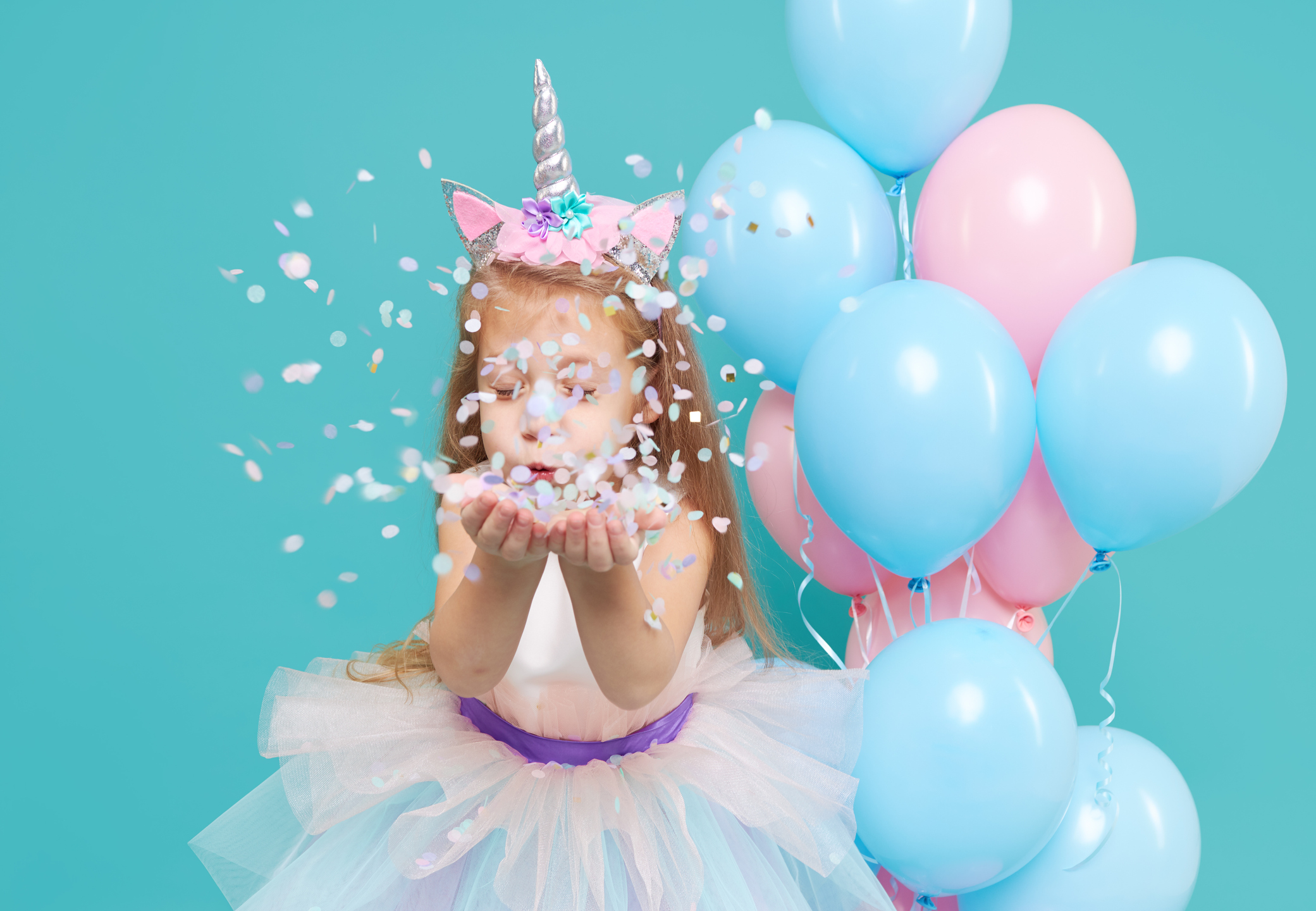 Little girl in unicorn costume for East End family fun