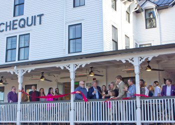 Officials held a ribbon cutting at The Chequit, owned by Stacey Soloviev, on May 7