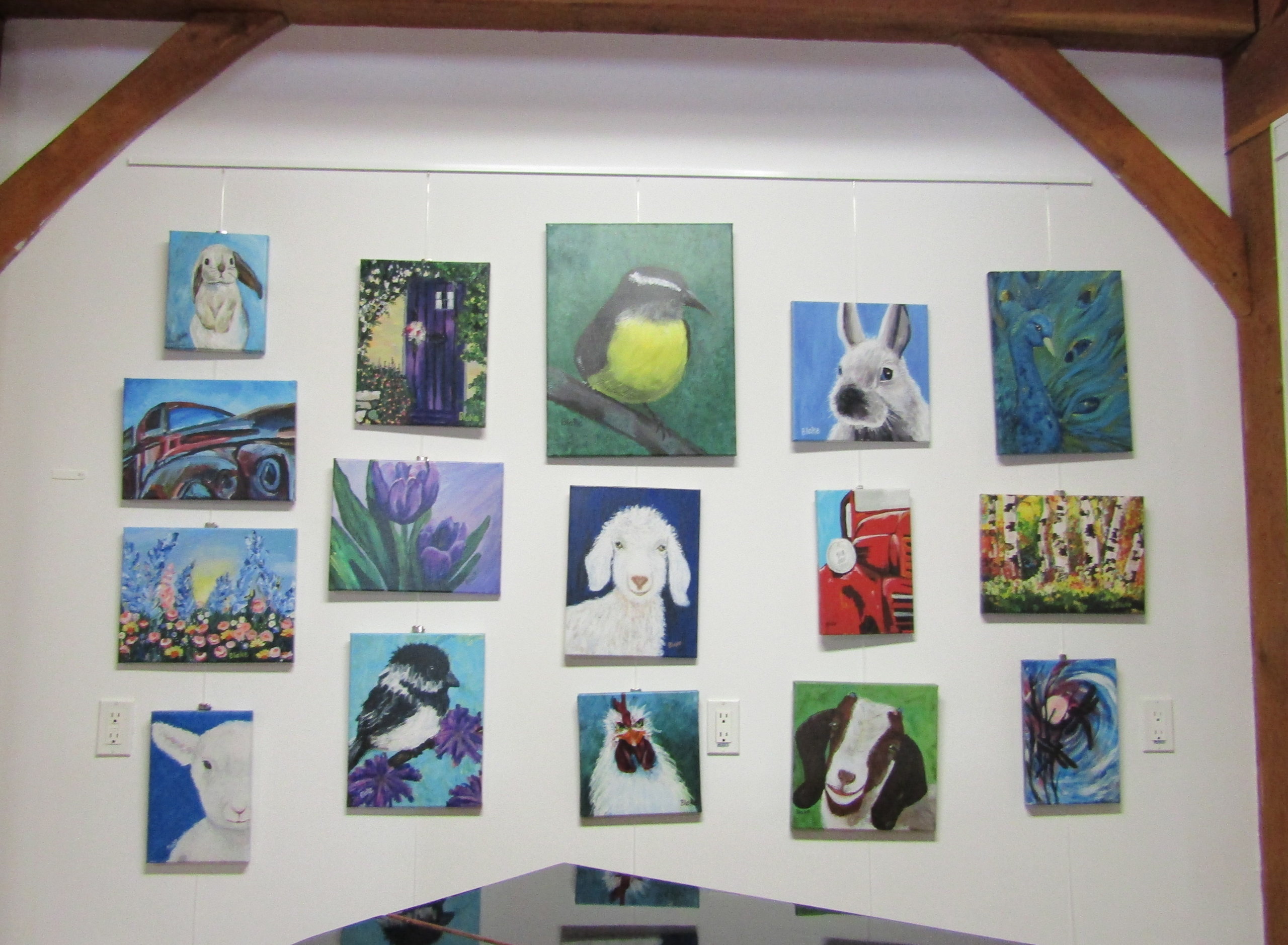 Paintings by Blake Henkel, who is autistic