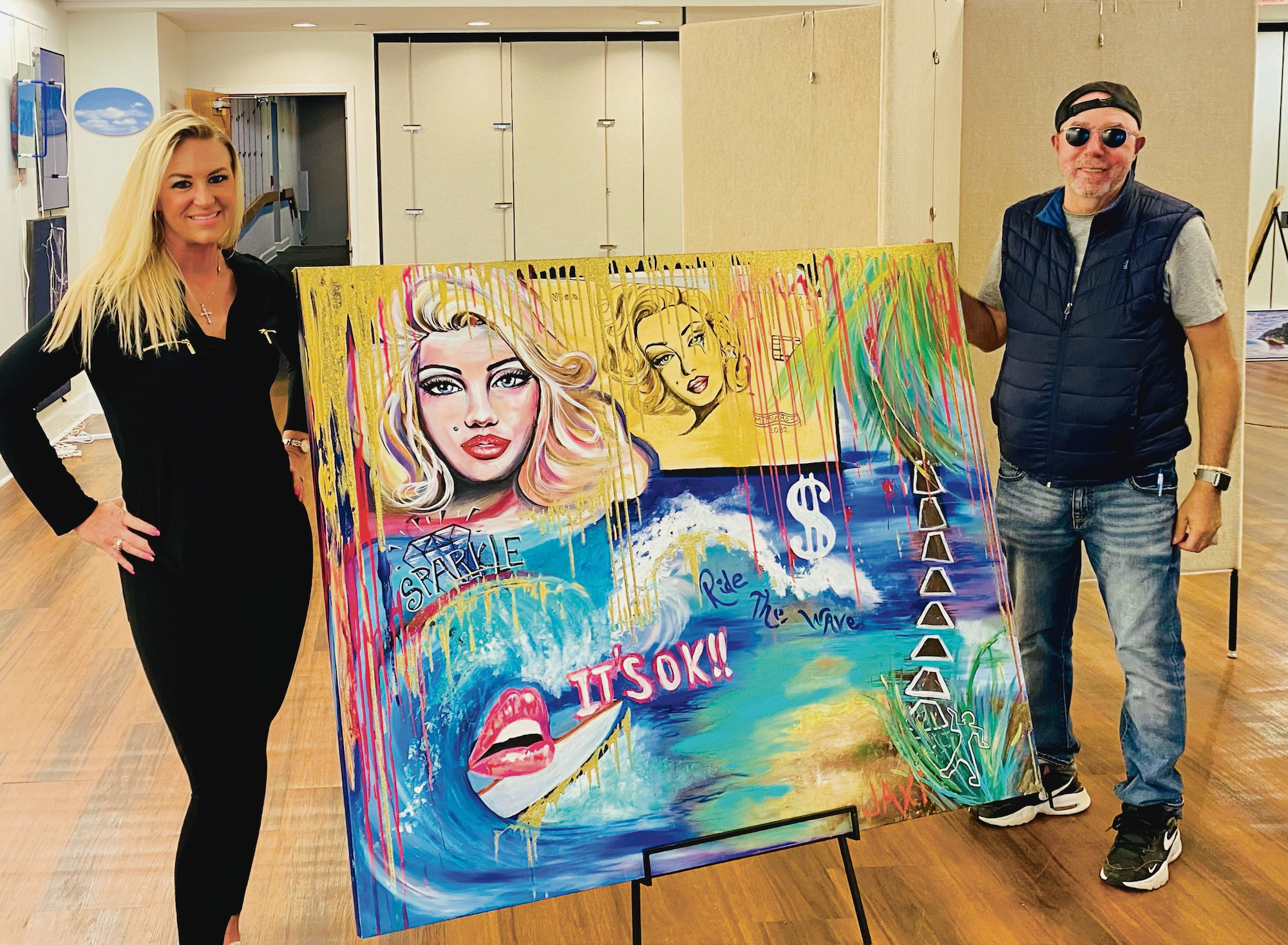 Julie O'Brien and Roger Sichel with "Journey" (48" x 60"), a JAXI collaboration between Julie O'Brien and Roger Sichel, on view at ARTACOM in Southampton