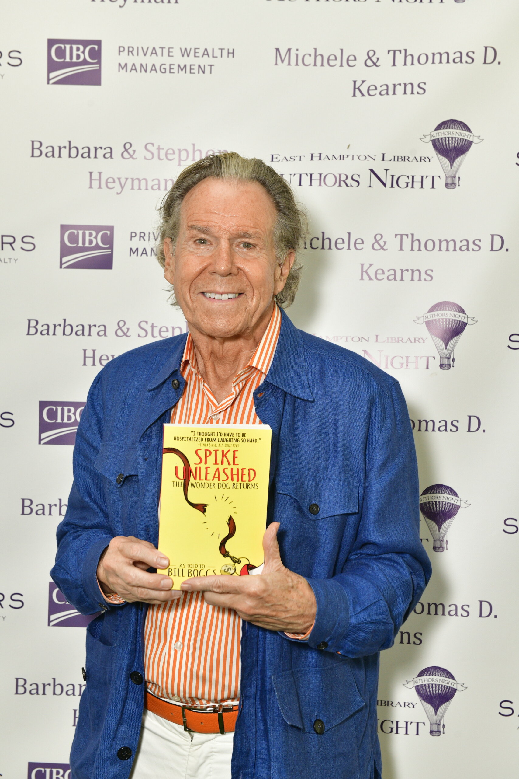 Bill Boggs with his latest Spike The Wonder Dog book at East Hampton Library Authors Night 2023