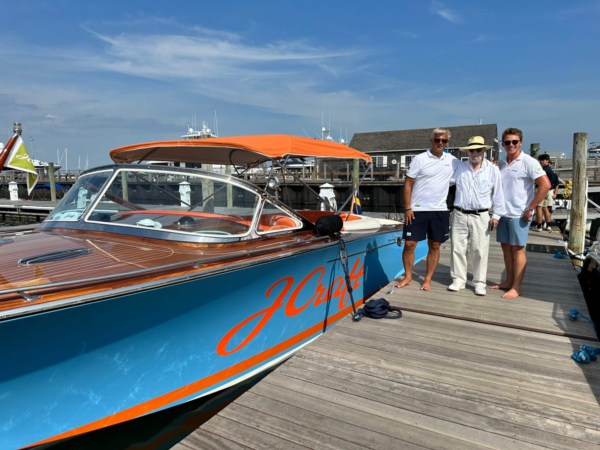 Aleksandar Milakovic, Dan Rattiner and the cruise's helmsman with the J Craft Yacht