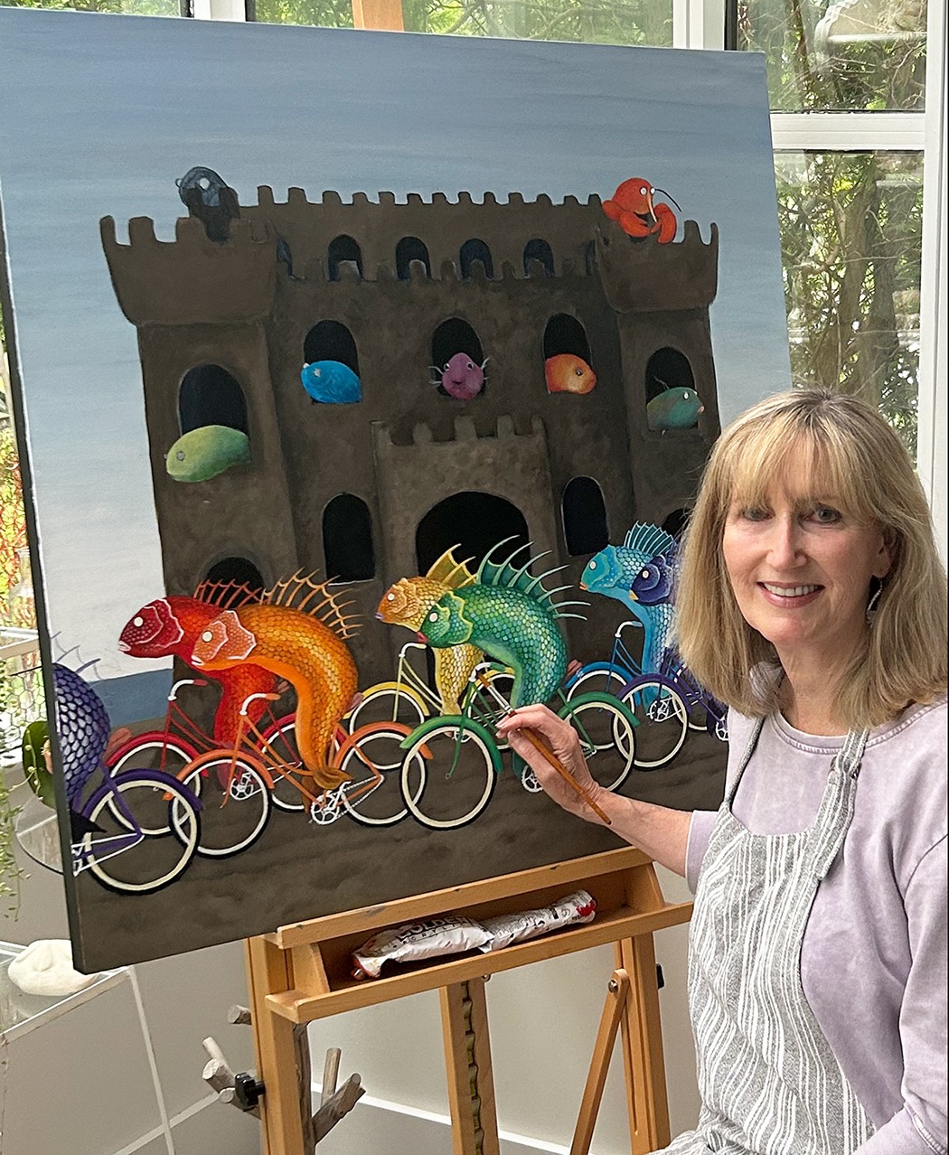 Cat Bachman working on a new painting