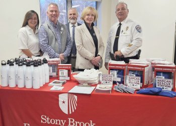 Chance Karr, Brian Babcock, Mark Strecker, Sheryl Heather, and Lt. Bill Kiernan with Narcan Rescue Station kits